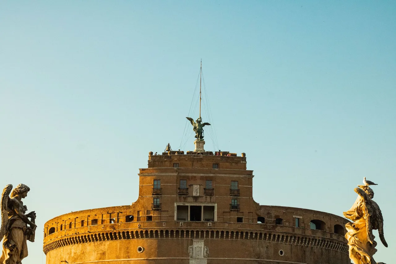 Castel Sant’Angelo in Rome, seen from the bridge with its stone statues